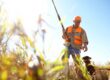 heasant hunter and bird dog on public prairie in Sac County, Iowa